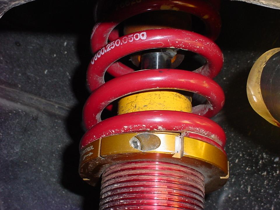 Coilovers hitting the strut bump stops